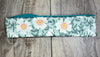 Green and White Floral Flowers on a light Green fabric with moisture wicking underneath of light green to match