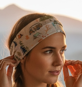 Woman with Camper van and tents scattered throughout the RV headband