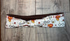 Handmade double-sided workout headband with wizard themed print on white and solid brown fabric