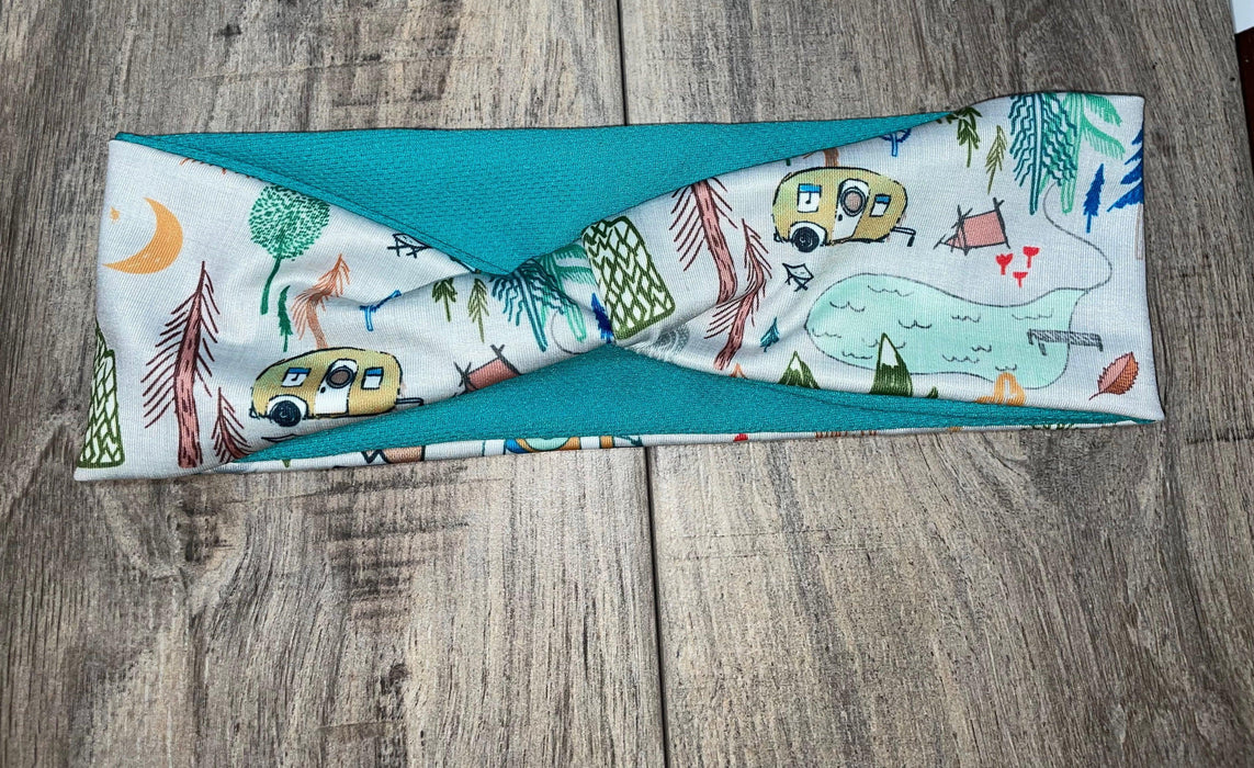 Handmade workout headband with camping-themed illustrations and teal fabric from Athena Fitness Collections