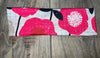 Athena Fitness Collections handmade workout headband with pink floral pattern on wooden surface