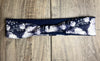Blue and White Flowers on a dark navy background with navy moisture wicking underneath to match