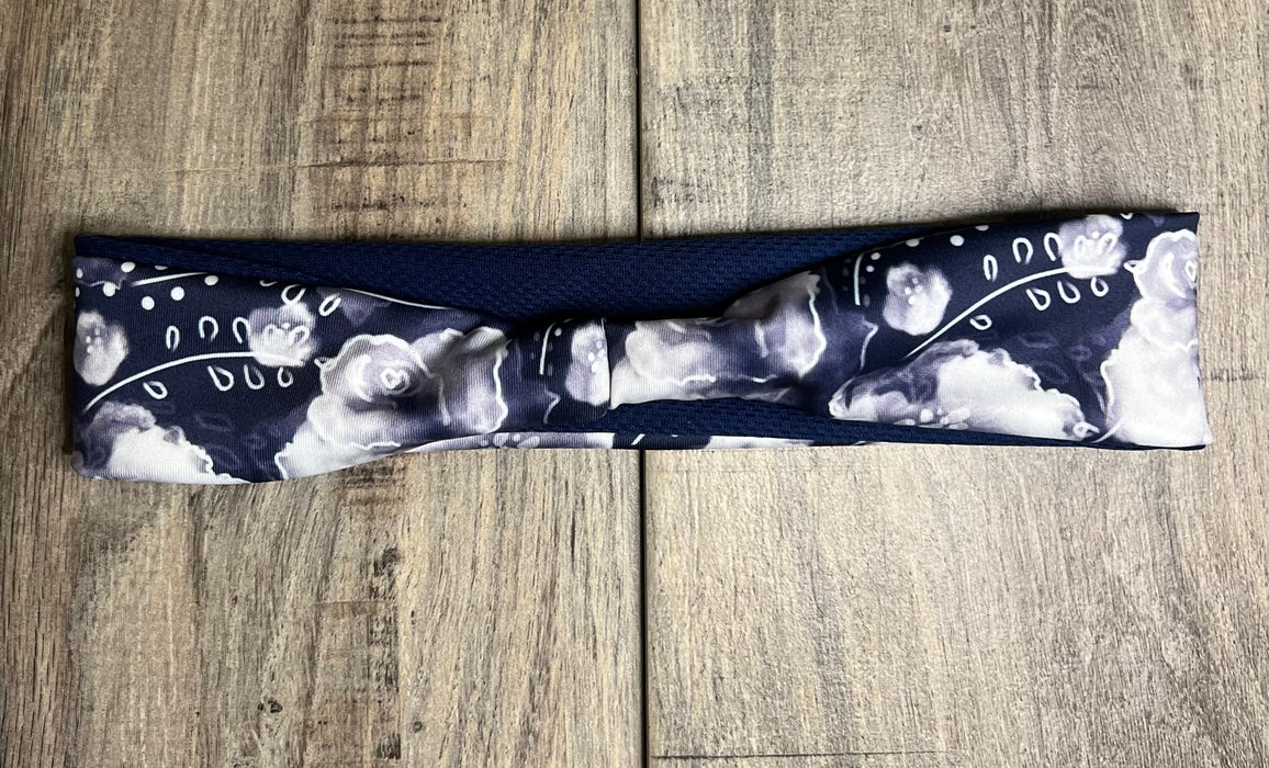 Blue and White Flowers on a dark navy background with navy moisture wicking underneath to match